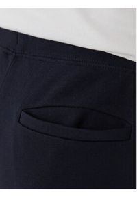 TOMMY HILFIGER - Tommy Hilfiger Spodnie dresowe Global Stripe MW0MW42882 Niebieski Regular Fit. Kolor: niebieski. Materiał: bawełna #2