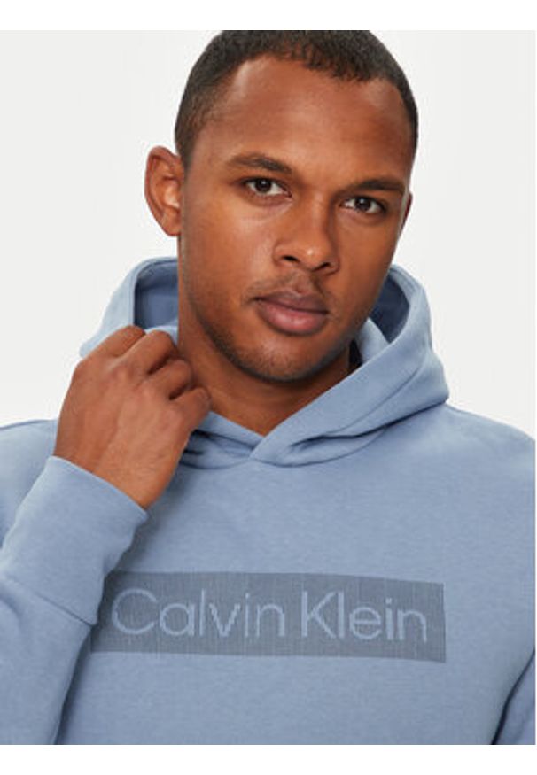 Calvin Klein Bluza Striped Logo K10K113552 Niebieski Regular Fit. Kolor: niebieski. Materiał: bawełna, syntetyk