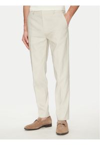 Calvin Klein Spodnie materiałowe K10K114400 Beżowy Slim Fit. Kolor: beżowy. Materiał: len, lyocell