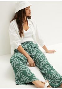 bonprix - Spodnie palazzo z nadrukiem. Kolor: zielony. Wzór: nadruk. Styl: elegancki