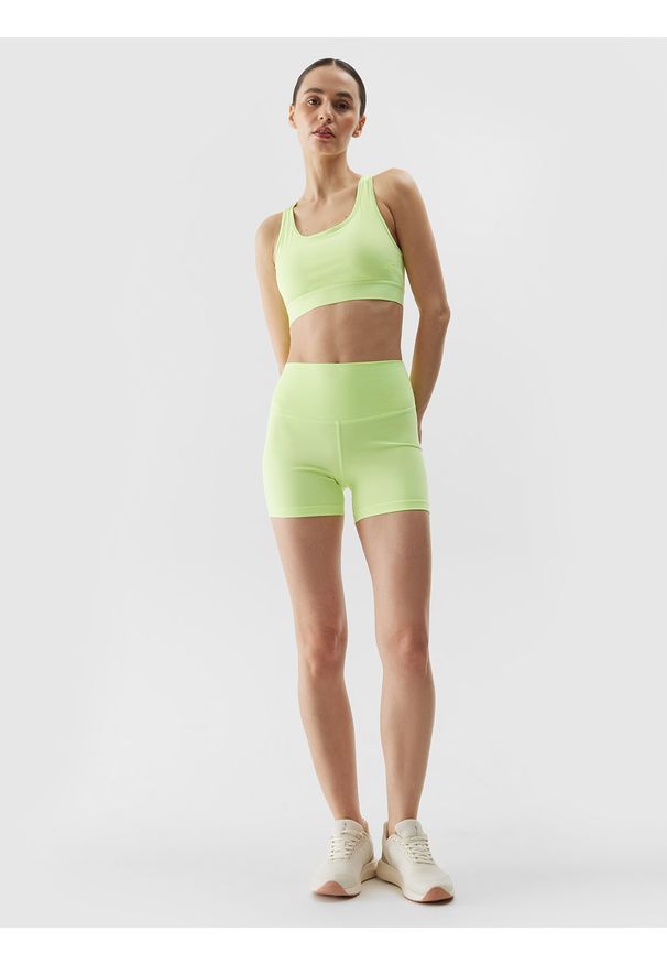 4f - 4F Legginsy krótkie treningowe z materiału z recyklingu damskie - zielone XS. Stan: podwyższony. Kolor: zielony. Materiał: materiał. Długość: krótkie. Wzór: jednolity, gładki, ze splotem. Sport: joga i pilates, fitness