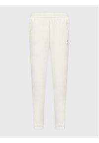 Reebok Spodnie dresowe Natural Dye HH9720 Beżowy Loose Fit. Kolor: beżowy. Materiał: bawełna, dresówka, syntetyk