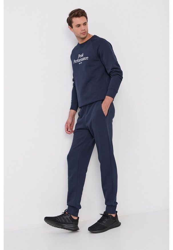 Peak Performance Bluza męska kolor granatowy melanżowa. Okazja: na co dzień. Kolor: niebieski. Materiał: dzianina, bawełna. Długość rękawa: raglanowy rękaw. Wzór: melanż. Styl: casual