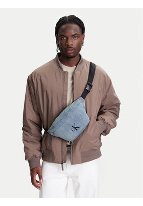 Calvin Klein Saszetka nerka Ckj Denim Waistbag LV04G3149G Błękitny. Kolor: niebieski. Materiał: materiał