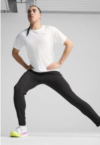 Puma - Męskie spodnie RUN VELOCITY o zwężanym kroju PUMA Black. Kolor: czarny. Sport: bieganie