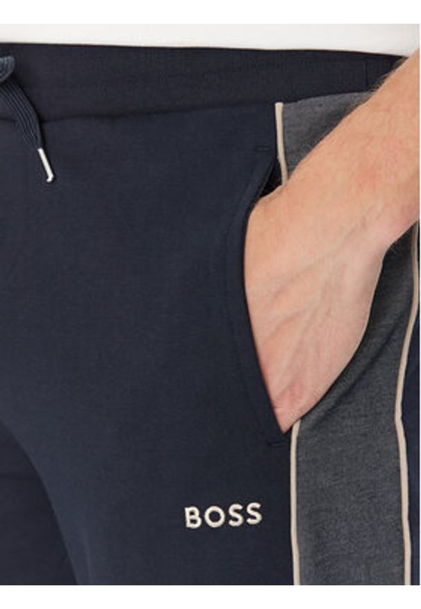 BOSS Spodnie dresowe 50540750 Granatowy Regular Fit. Kolor: niebieski. Materiał: bawełna, syntetyk