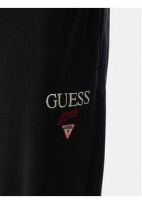 Guess Jeans Spodnie dresowe M6YB15 K4842 Czarny Regular Fit. Kolor: czarny. Materiał: bawełna #5