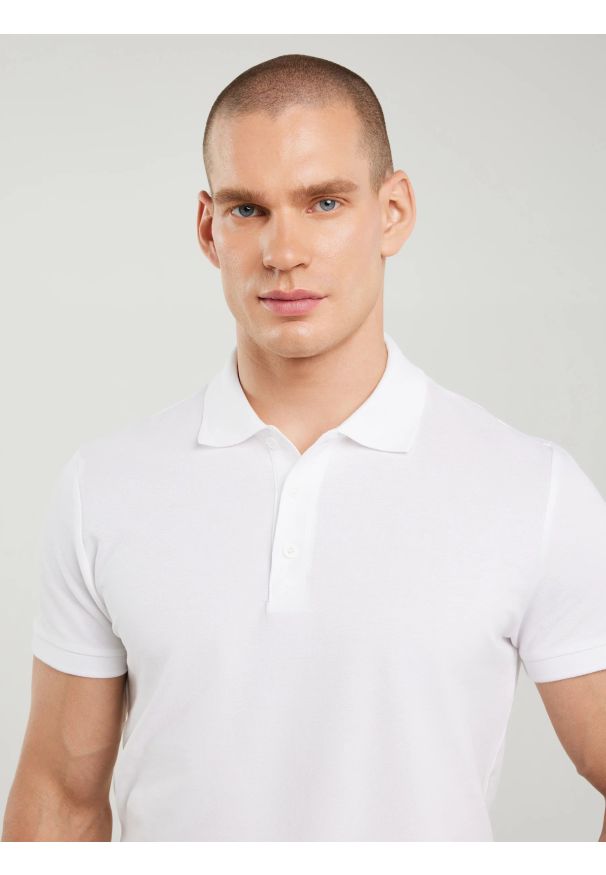 Big-Star - Koszulka męska polo biała Markolinos 101. Typ kołnierza: polo. Kolor: biały. Materiał: jeans, tkanina. Wzór: kolorowy. Styl: elegancki, klasyczny
