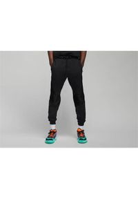 Spodnie sportowe męskie Nike Air Jordan Zion. Kolor: czarny. Materiał: syntetyk, bawełna, materiał. Długość: długie