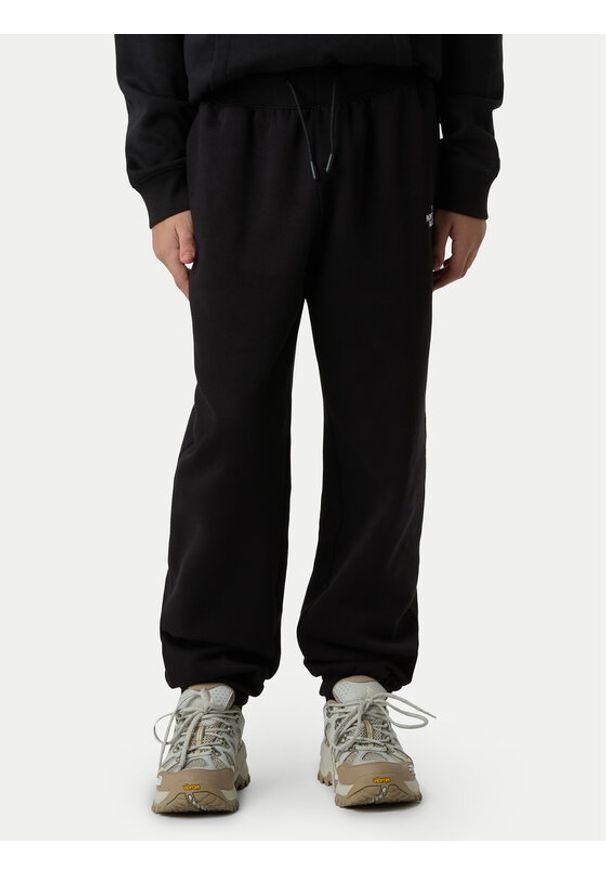 The North Face Spodnie dresowe Essential NF0A8BHS Czarny Regular Fit. Kolor: czarny. Materiał: bawełna, syntetyk