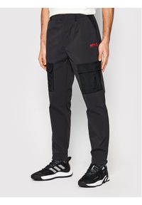 Adidas - adidas Spodnie materiałowe Adventure Cargo HF4799 Czarny Regular Fit. Kolor: czarny. Materiał: syntetyk