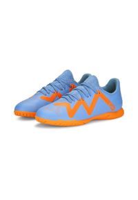 Buty piłkarskie dla dzieci Puma Future Play IT JR. Zapięcie: sznurówki. Kolor: pomarańczowy, wielokolorowy, biały. Materiał: materiał, syntetyk. Szerokość cholewki: normalna. Sport: piłka nożna