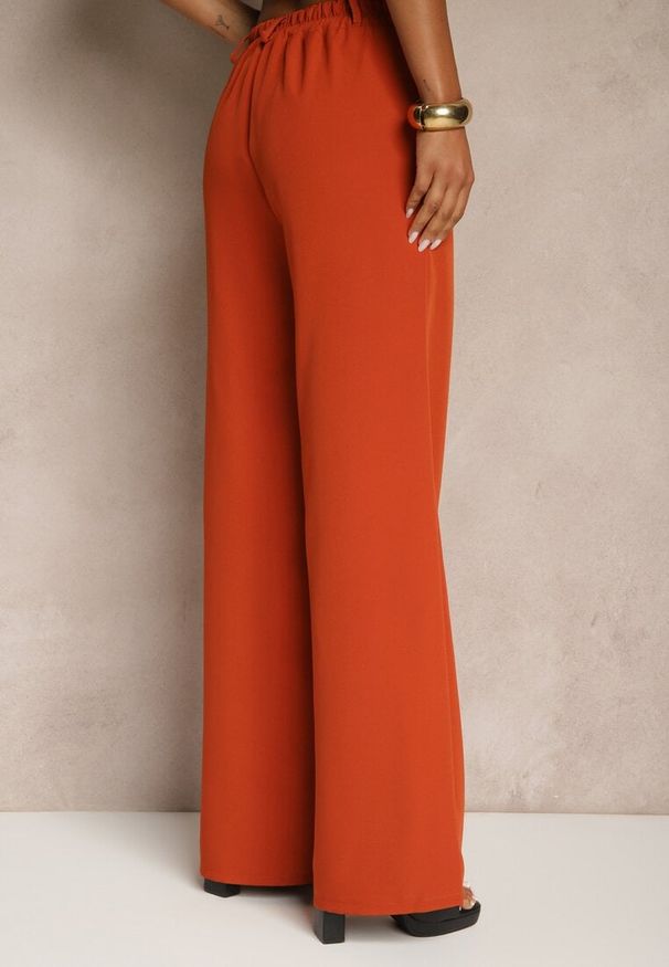Renee - Pomarańczowe Szerokie Spodnie High Waist z Gumką w Pasie Eternel. Stan: podwyższony. Kolor: pomarańczowy. Materiał: tkanina