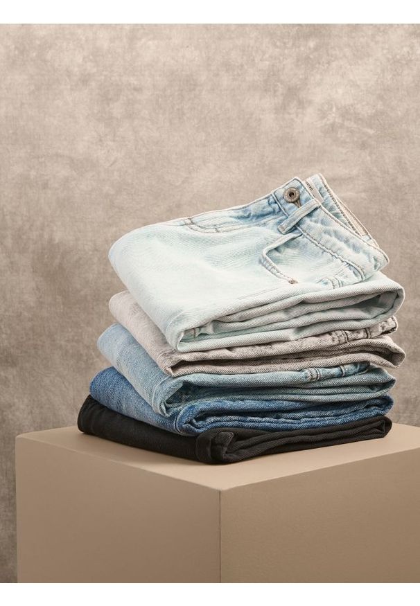 Reserved - Jeansy wide leg z przetarciem - niebieski. Kolor: niebieski