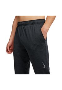 Spodnie treningowe męskie Nike Yoga Dri-FIT CZ2208. Materiał: materiał, włókno, dresówka, dzianina, poliester. Technologia: Dri-Fit (Nike). Wzór: gładki. Sport: fitness #4