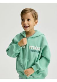 Reserved - Rozpinana bluza oversize - jasnoturkusowy. Kolor: turkusowy. Materiał: dzianina, bawełna