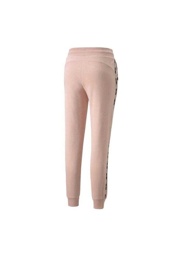 Puma - Spodnie Do Joggingu Damskie Power Tape. Kolor: różowy. Materiał: dresówka. Sport: bieganie