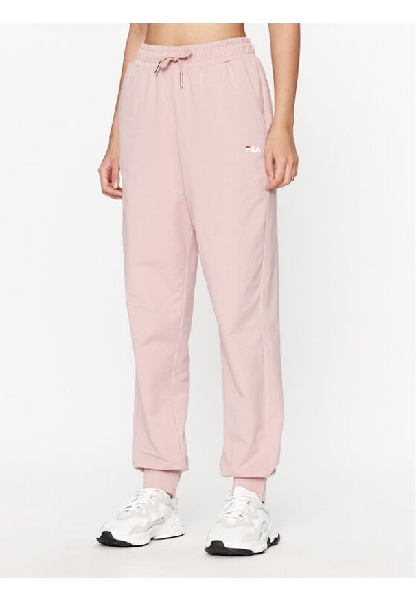 Fila Spodnie dresowe FAW0559 Różowy Relaxed Fit. Kolor: różowy. Materiał: bawełna, dresówka