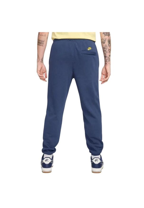 Nike - Spodnie Do Joggingu Męskie Club. Kolor: niebieski. Materiał: dresówka. Sport: bieganie