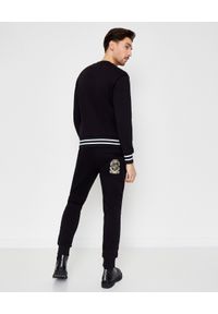 Versace Jeans Couture - VERSACE JEANS COUTURE - Czarna bluza z nadrukiem. Kolor: czarny. Długość rękawa: długi rękaw. Długość: długie. Wzór: nadruk #2