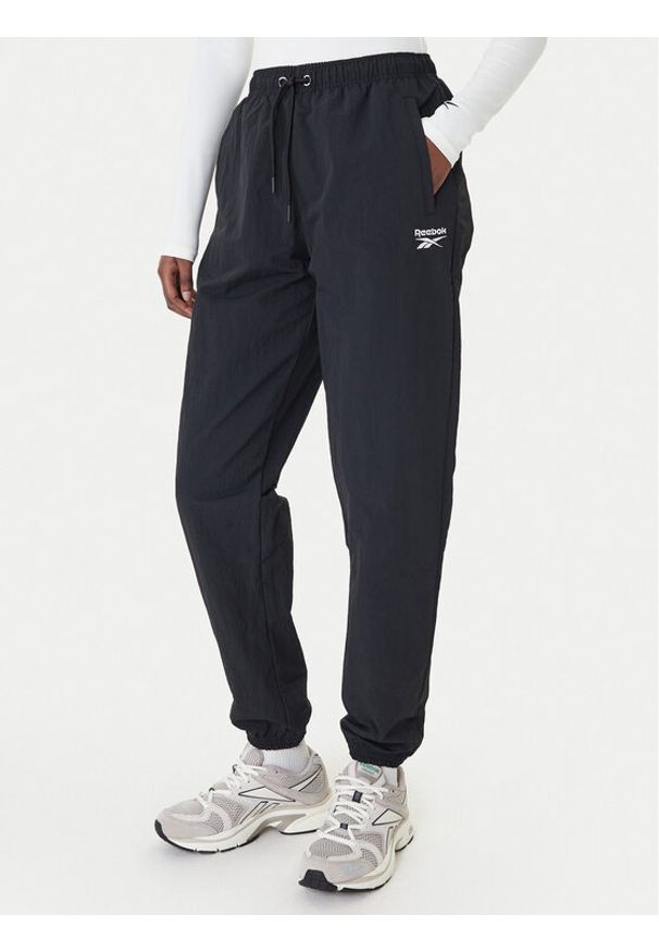 Reebok Spodnie dresowe Galina RK25518CCW Czarny Relaxed Fit. Kolor: czarny. Materiał: syntetyk