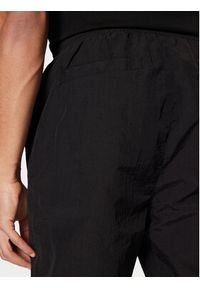 Karl Kani Spodnie dresowe Sport Patch Essential 60030077 Czarny Relaxed Fit. Kolor: czarny. Materiał: syntetyk #3