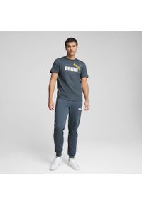 Puma - Spodnie sportowe z dwukolorowym logo męskie PUMA Essentials+. Kolor: szary. Materiał: dresówka