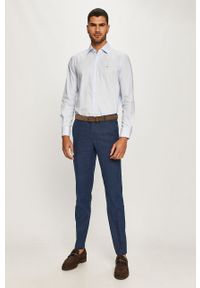 Tommy Hilfiger Tailored - Spodnie. Kolor: niebieski. Materiał: bawełna, materiał, wiskoza, elastan, tkanina, len, poliester. Wzór: gładki #5