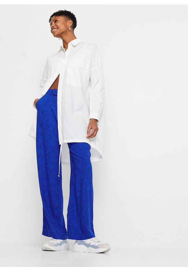 bonprix - Spodnie palazzo z lejącej wiskozy. Kolor: niebieski. Materiał: wiskoza. Wzór: paisley, nadruk