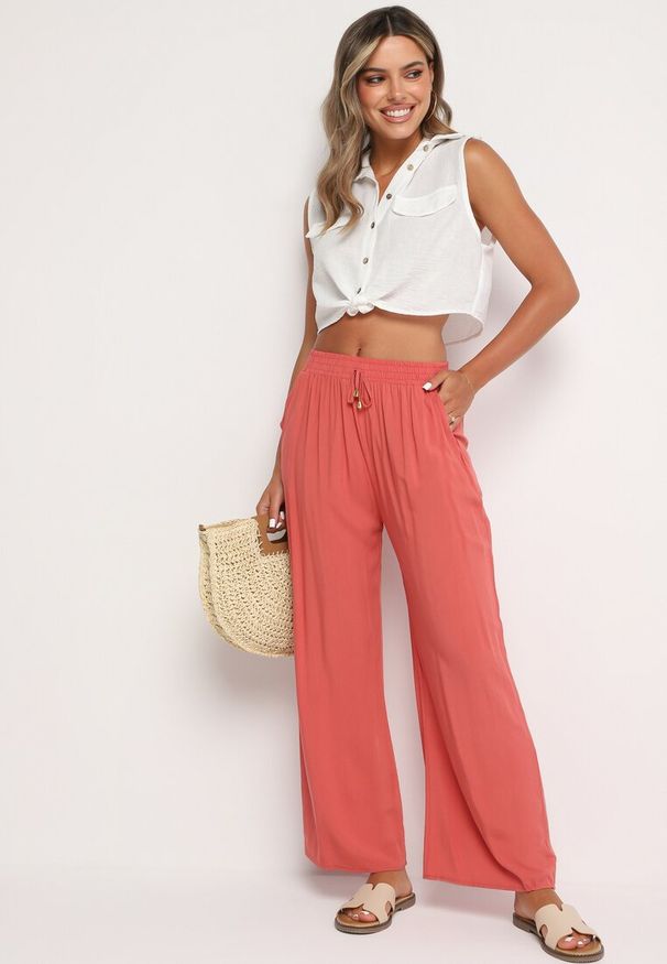 Born2be - Różowe Gładkie Spodnie z Gumką w Pasie i Szerokimi Nogawkami Alathera. Kolor: różowy. Wzór: gładki. Sezon: lato