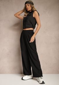 Renee - Czarne Szerokie Spodnie z Bawełną High Waist Ozdobione Koronką Efandiela. Okazja: na co dzień, na imprezę. Stan: podwyższony. Kolor: czarny. Materiał: bawełna, koronka. Długość: długie. Wzór: koronka, aplikacja. Styl: casual, elegancki