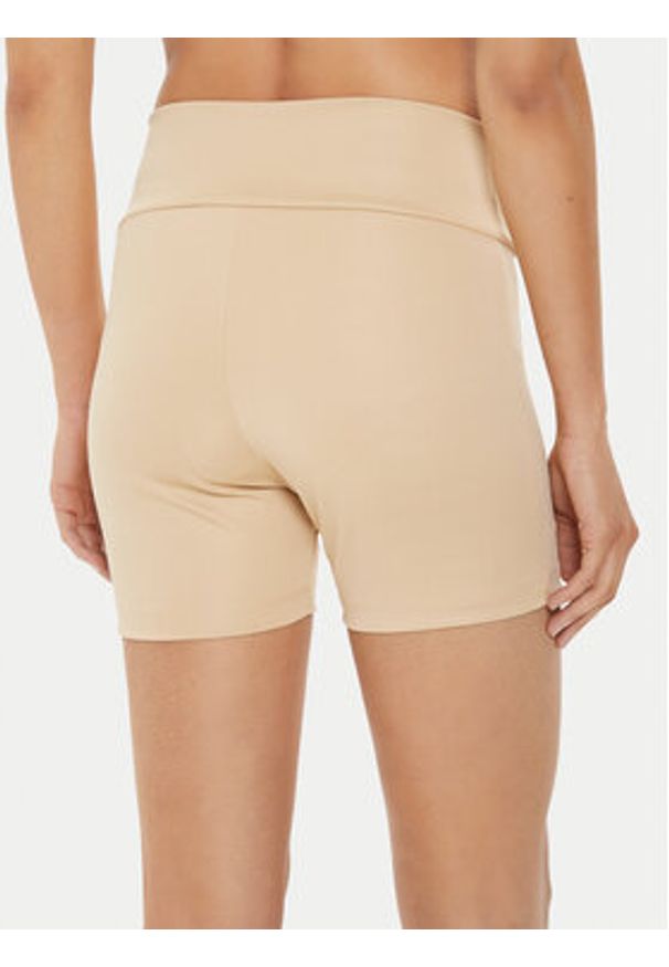 Karl Kani Szorty sportowe Small Serif 6113099 Beżowy Slim Fit. Kolor: beżowy. Materiał: syntetyk