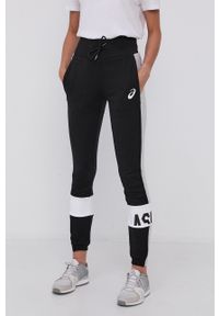 Asics - Spodnie. Kolor: czarny. Wzór: gładki #1