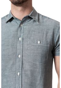 Wrangler - KOSZULA MĘSKA KRÓTKI RĘKAW WRANGLER S/S 1PKT SHIRT OCEAN TEAL W5916LPDP. Materiał: materiał. Długość rękawa: krótki rękaw. Długość: krótkie. Wzór: melanż #4