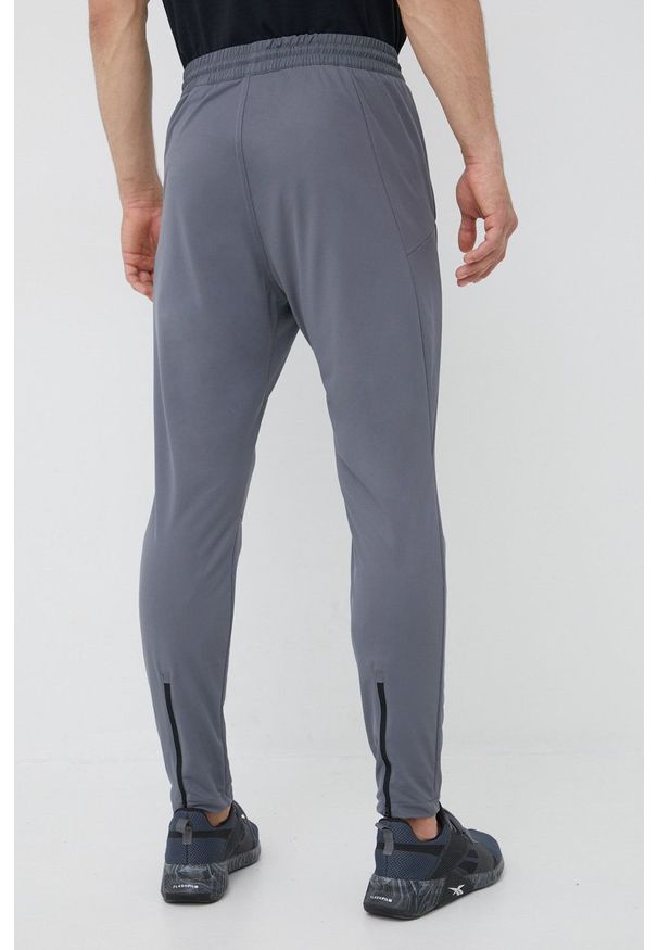Reebok spodnie dresowe Workout Ready GJ0838 męskie kolor szary gładkie. Kolor: szary. Materiał: dresówka. Wzór: gładki
