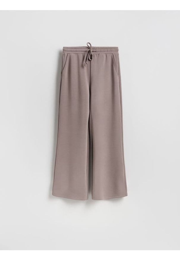 Reserved - Spodnie z szeroką nogawką - brązowy. Kolor: brązowy. Materiał: dzianina