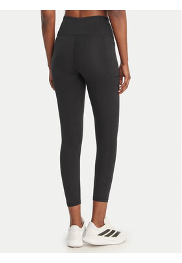 Under Armour Legginsy UA Motion 1388647 Czarny Slim Fit. Kolor: czarny. Materiał: syntetyk