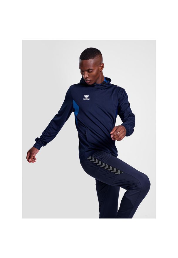 Poliestrowa bluza z kapturem Hummel Authentic. Typ kołnierza: kaptur. Kolor: niebieski. Materiał: poliester. Sport: fitness