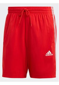 Adidas - adidas Szorty sportowe Essentials Chelsea IC1486 Czerwony Regular Fit. Kolor: czerwony. Materiał: syntetyk. Styl: sportowy