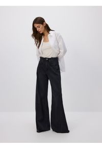 Reserved - Jeansy wide leg z rozdarciami - czarny. Kolor: czarny