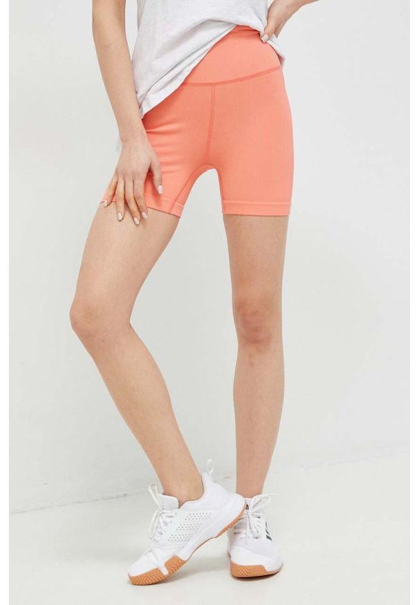 Helly Hansen szorty sportowe Allure damskie kolor pomarańczowy gładkie high waist. Stan: podwyższony. Kolor: pomarańczowy. Materiał: skóra, dzianina. Wzór: gładki. Styl: sportowy