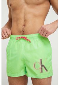 Calvin Klein szorty kąpielowe kolor zielony. Kolor: zielony. Materiał: tkanina, poliester, materiał. Wzór: nadruk