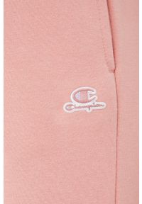 Champion spodnie dresowe 114925 damskie kolor różowy gładkie. Kolor: różowy. Materiał: dresówka. Wzór: gładki