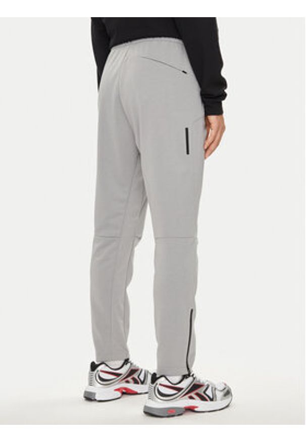 Reebok Spodnie dresowe 100075761 Szary Regular Fit. Kolor: szary. Materiał: syntetyk