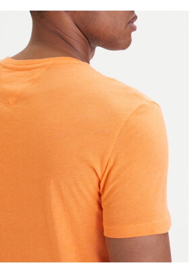 Tommy Jeans T-Shirt DM0DM20363 Pomarańczowy Slim Fit. Kolor: pomarańczowy. Materiał: bawełna
