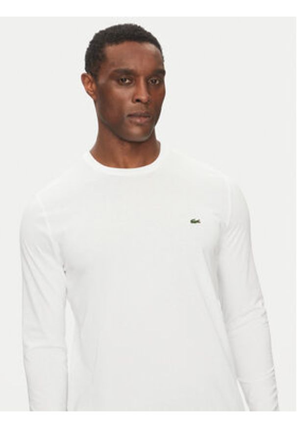 Lacoste Longsleeve TH6712 Biały Regular Fit. Kolor: biały. Materiał: bawełna. Długość rękawa: długi rękaw