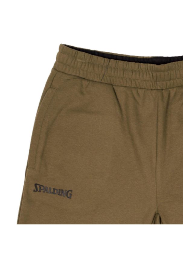 SPALDING - Szorty Spalding Flow. Kolor: niebieski. Sport: koszykówka