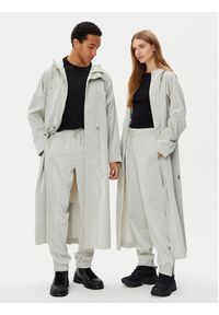 Rains Spodnie przeciwdeszczowe Unisex 18560 Beżowy Regular Fit. Kolor: beżowy. Materiał: syntetyk