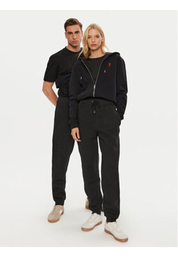 AMI PARIS Spodnie dresowe UTR237.749 Czarny Relaxed Fit. Kolor: czarny. Materiał: bawełna