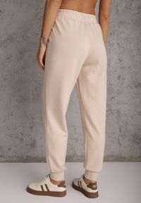 Renee - Beżowe Sportowe Spodnie Typu Jogger High Waist ze Ściągaczem w Talii Isirona. Okazja: na co dzień. Stan: podwyższony. Kolor: beżowy. Długość: krótkie. Styl: sportowy #3